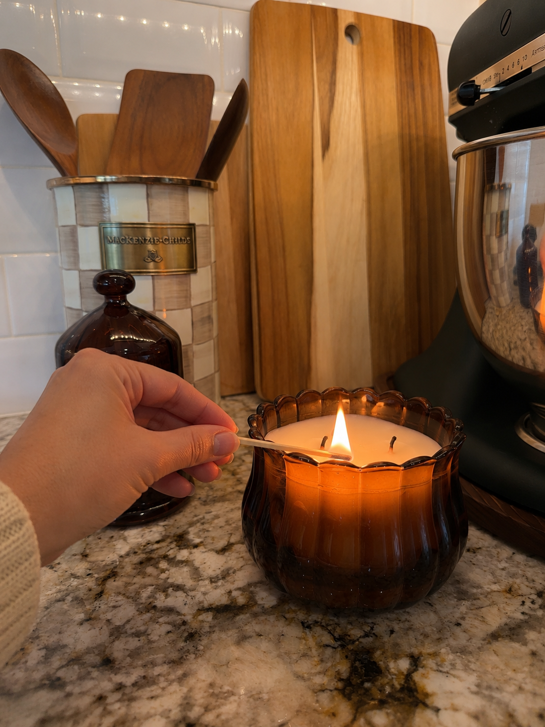Kitchen candle being lit